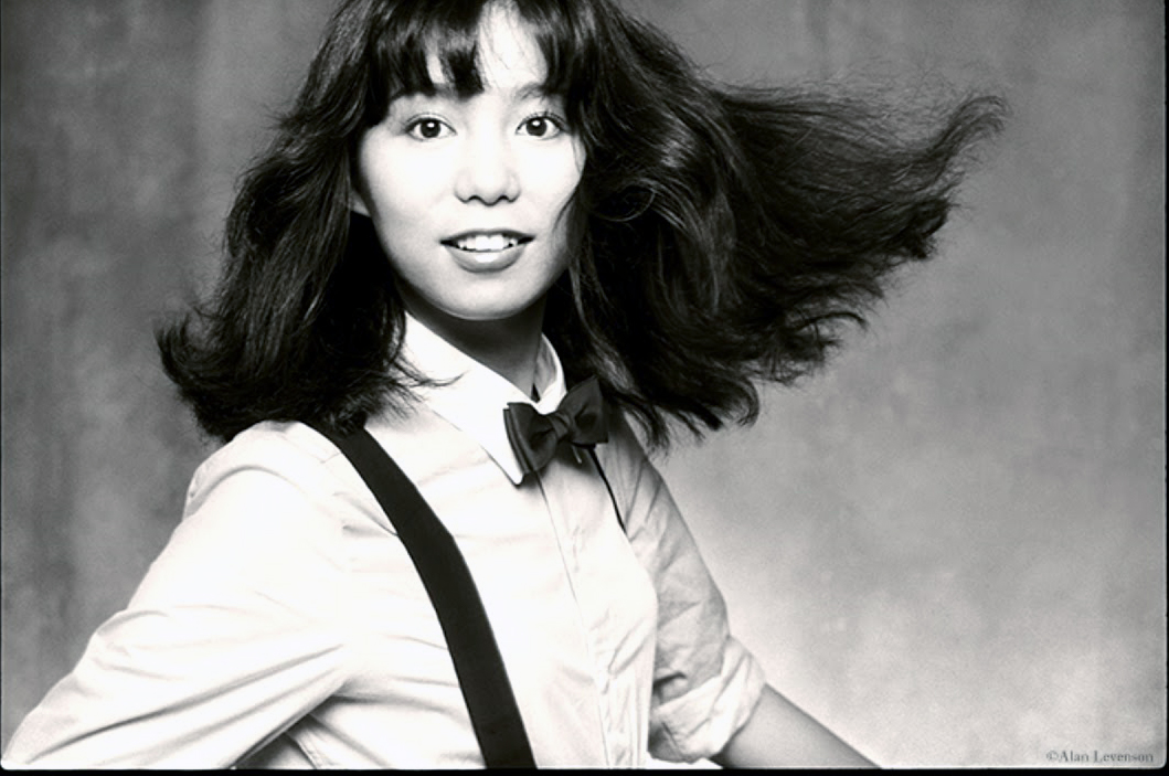 Levenson, Alan. Mariya Takeuchi, A Moment In Time.  1980. (This is a photo of Mariya Takeuchi.)