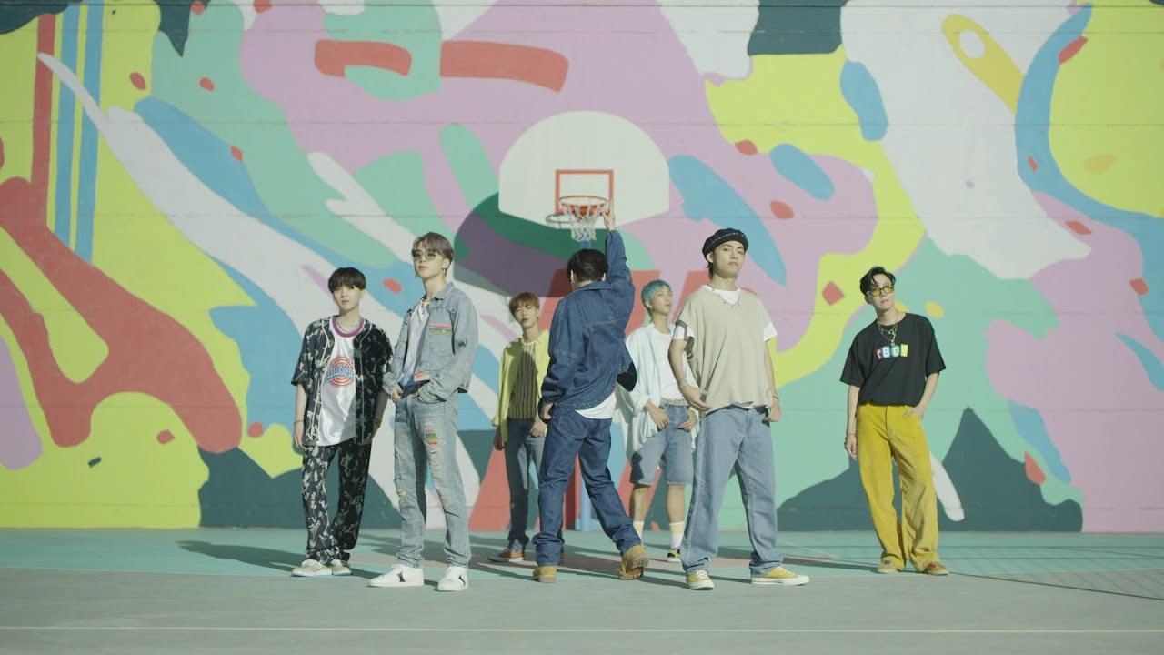 "Dynamite." BTS. 2020. Big Hit Entertainment (This is a photo of the members of BTS at a colorful basketball court.)