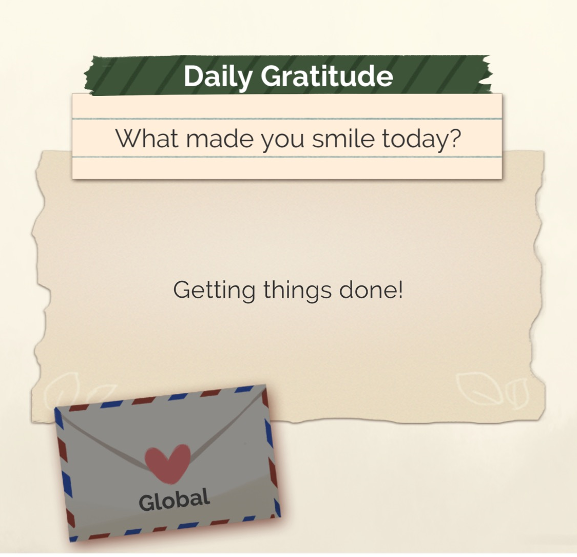 "Kinder World's" gratitude writing has a white envelope with a red and white border, and pink heart on it. ("Kinder World." Lumi Interactive. 2021.)