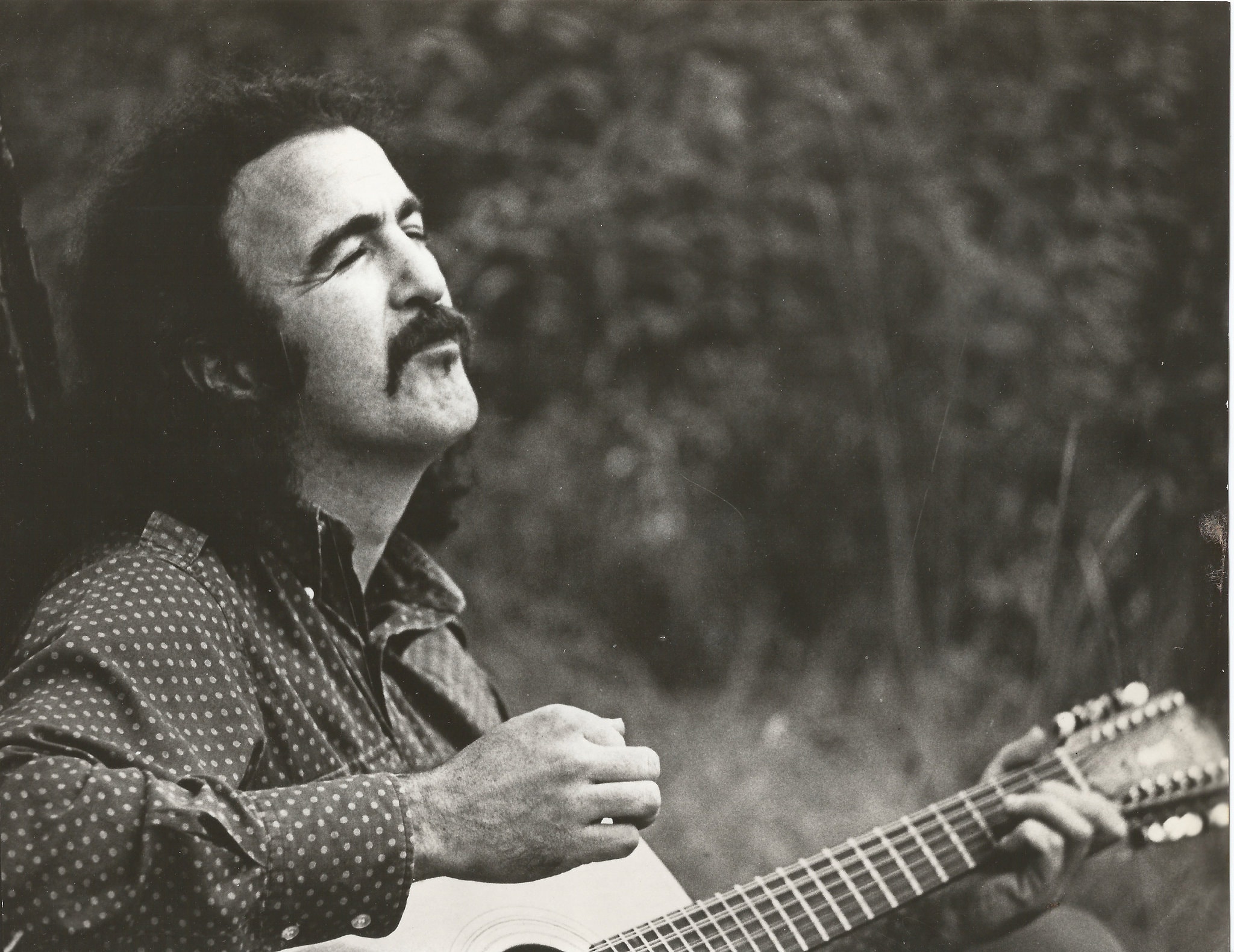 Jim Sullivan passionately playing his beloved guitar.  (Photo by Jim Sullivan Estate.)