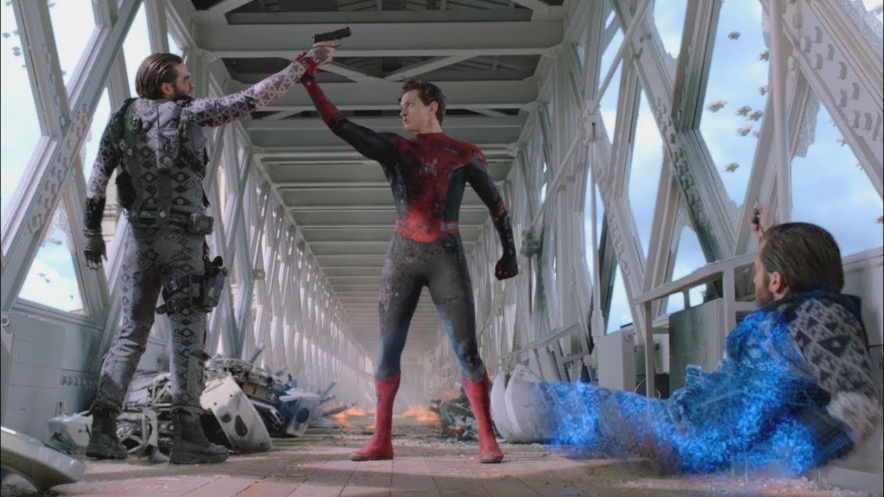 Spider-man fights Mysterio in bridge tunnel. Spiderman defends against Mysterio's gun.