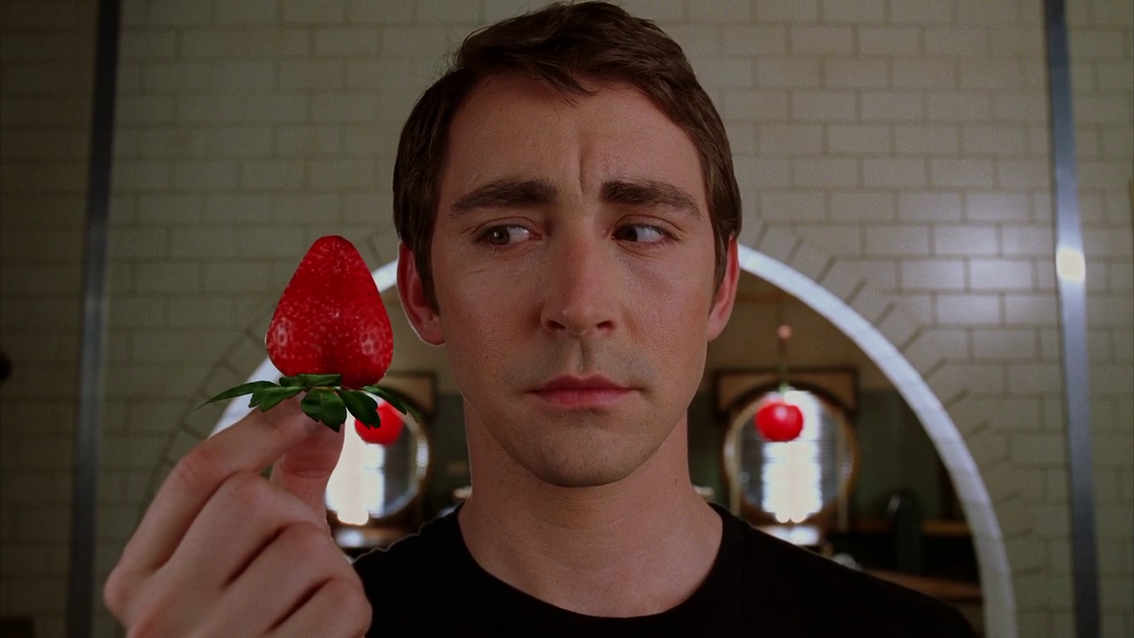 Ned (Lee Pace) is pictured holding a ripe strawberry. 

Pushing Daisies. Season 1, Episode 1: "Pie-Lette." 2007-2009. ABC.