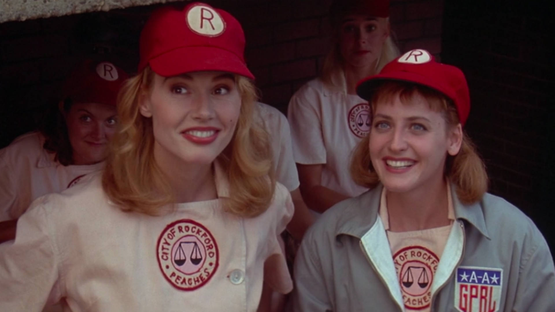 Dottie and Kit of the Rockford Peaches bring each other joy in "A League Of Their Own." (Marshall, Penny, dir. A League Of Their Own. 1992.)