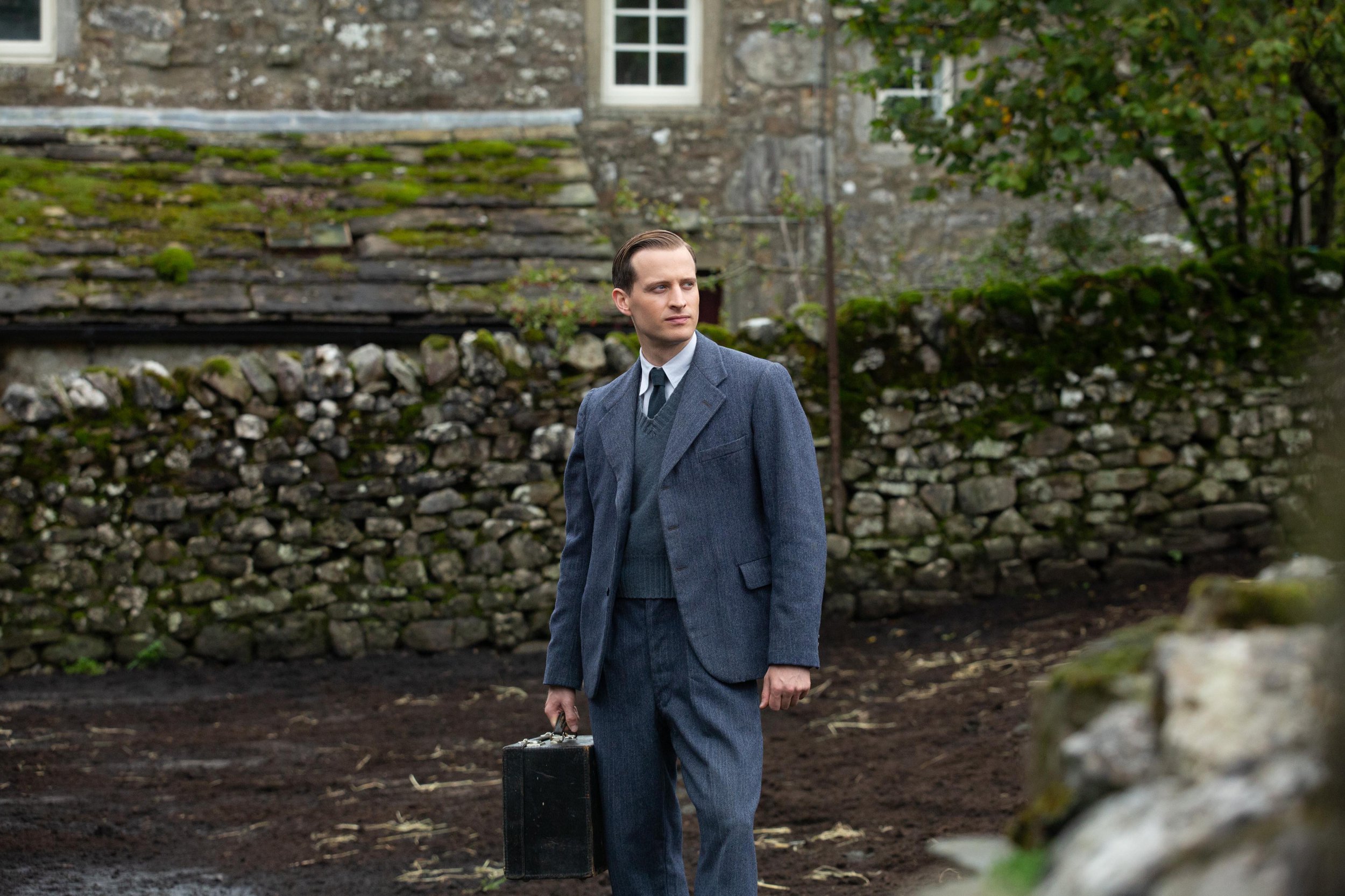 James Herriot with his briefcase in a shot from All Creatures Great and Small, 2020. (Photo by Playground Entertainment/PBS).
