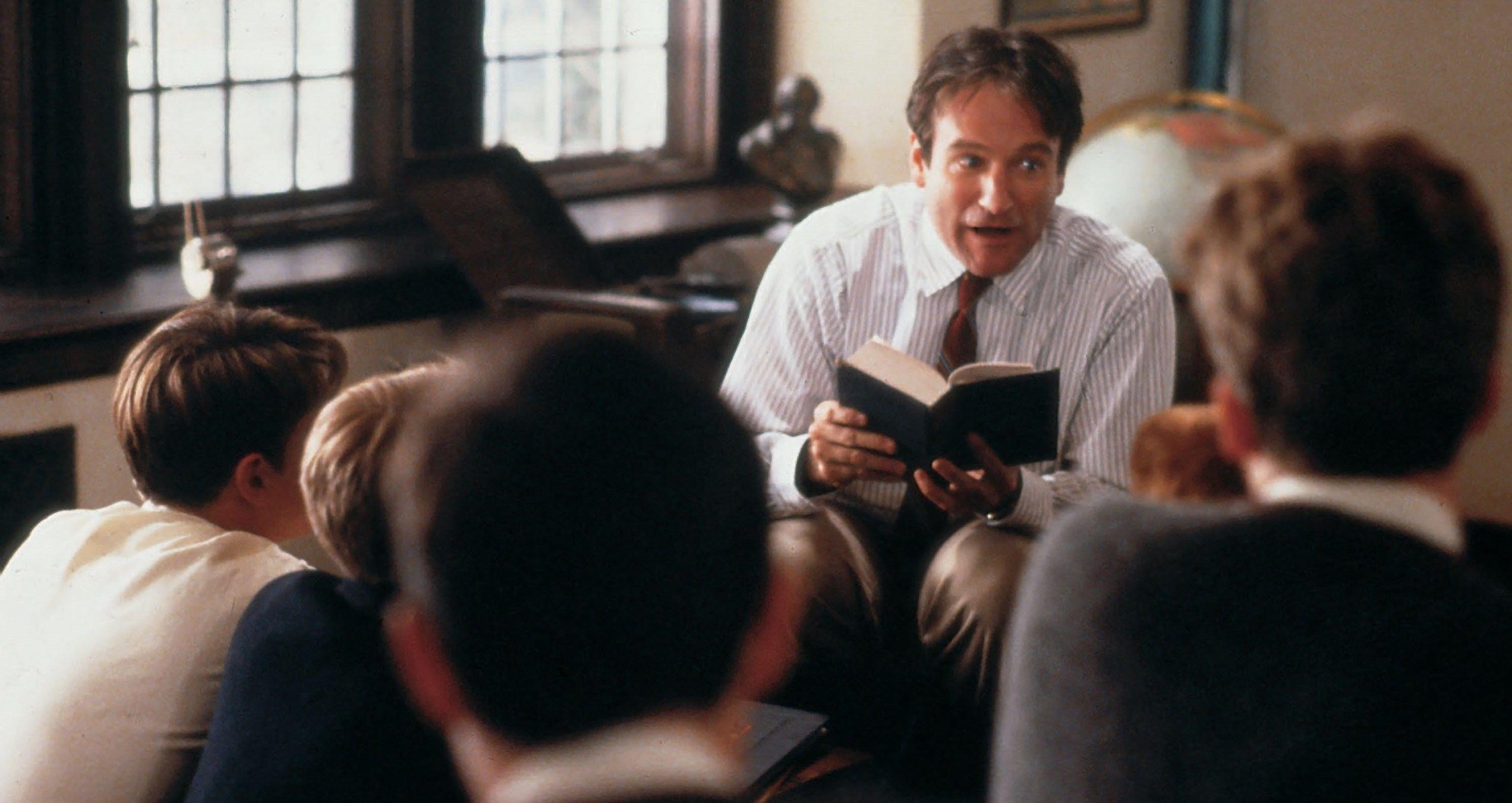 Robin Williams as English teacher Mr. Keating instructs a class in poetry. 