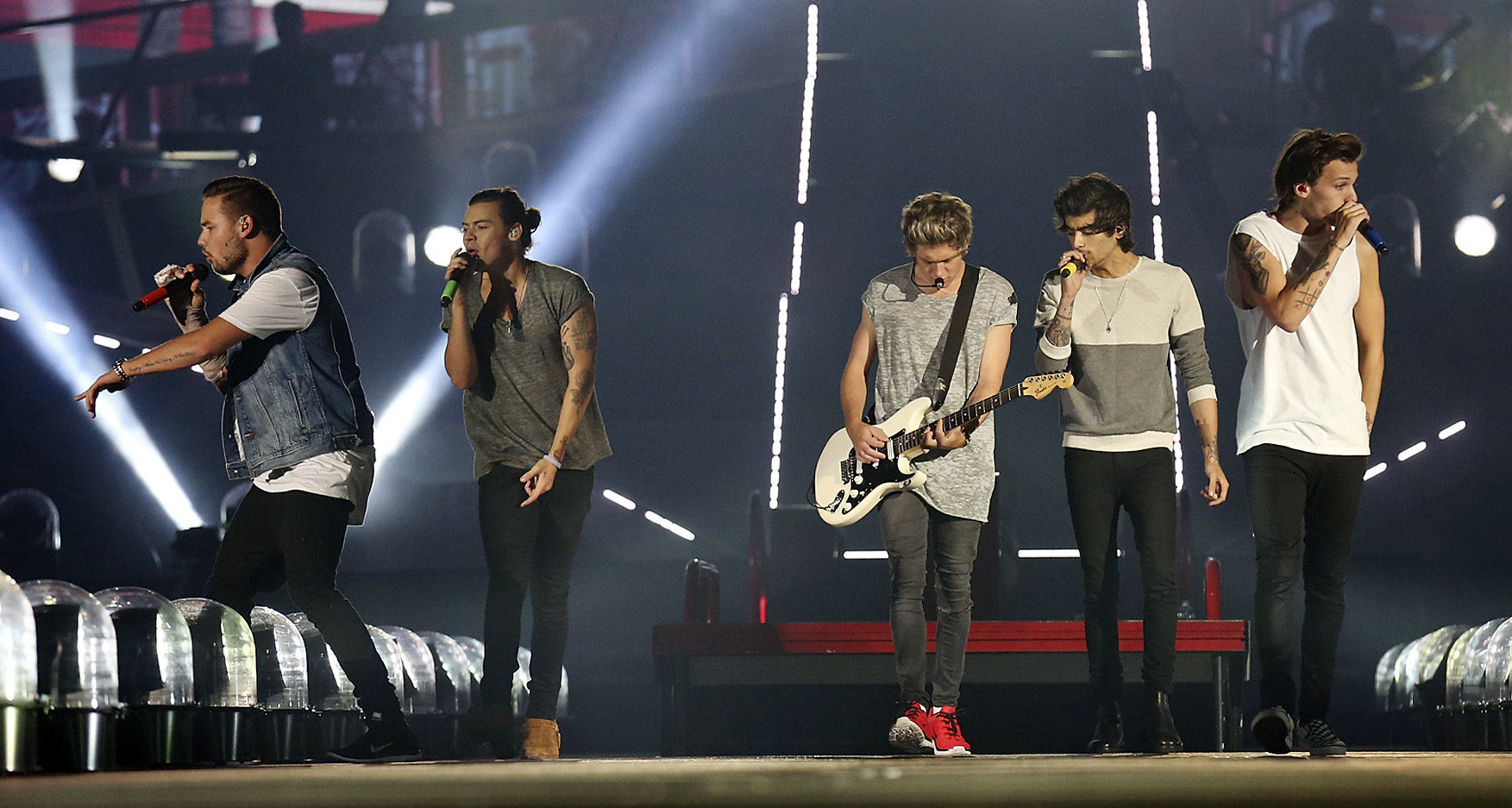 One Direction performs their concert in 2014. 