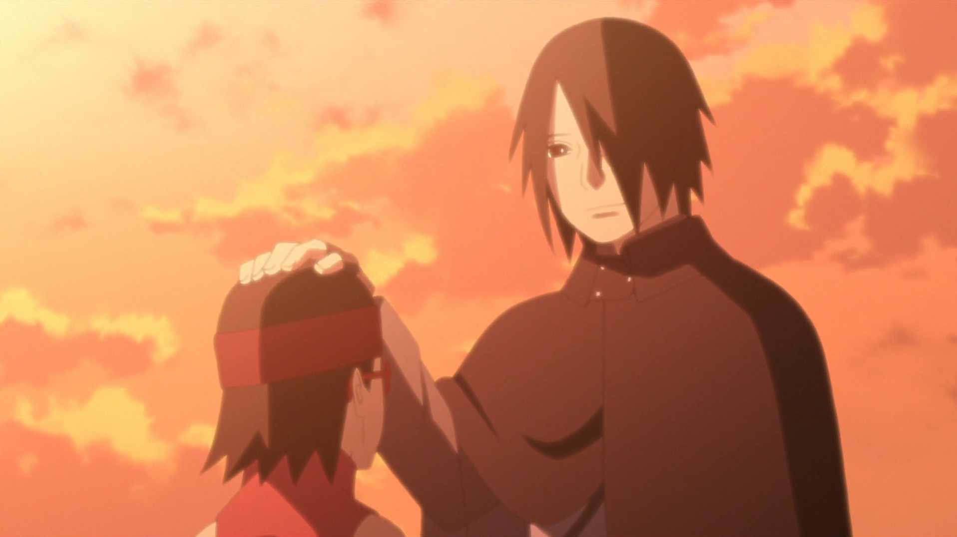 Sasuke shares a tender moment with his daughter, Sarada. 