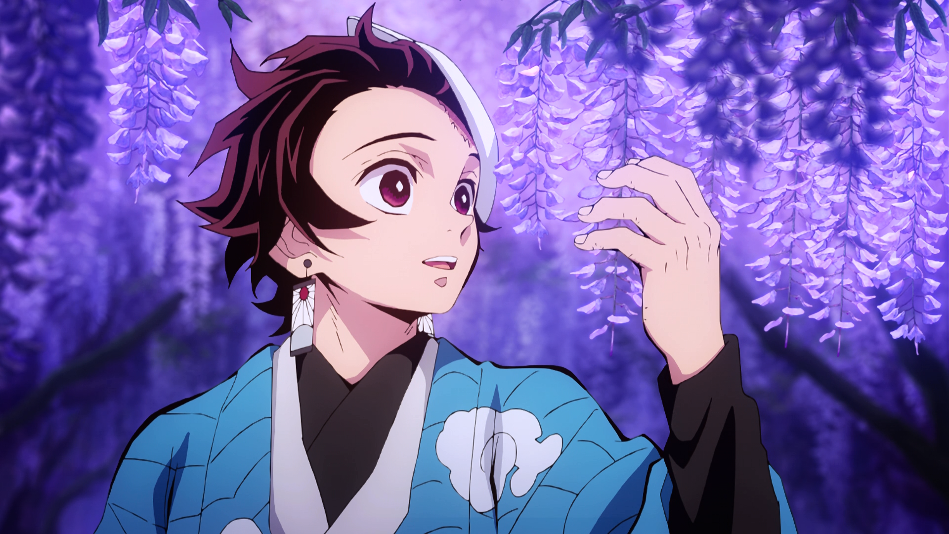 Tanjiro stops to admire the wisteria trees. 