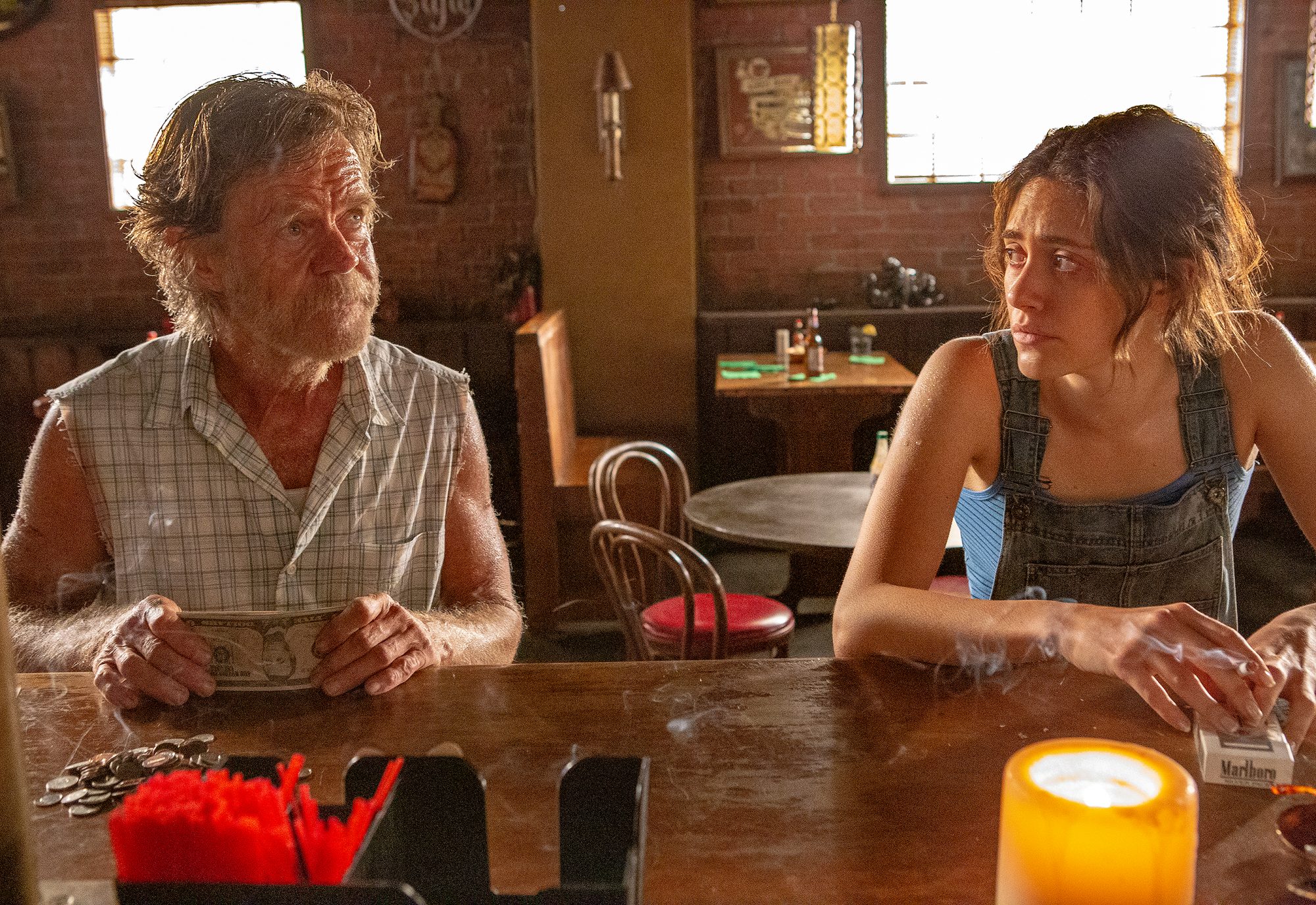 Frank Gallagher and Fiona Gallagher are sitting at the Alibi's bar together.