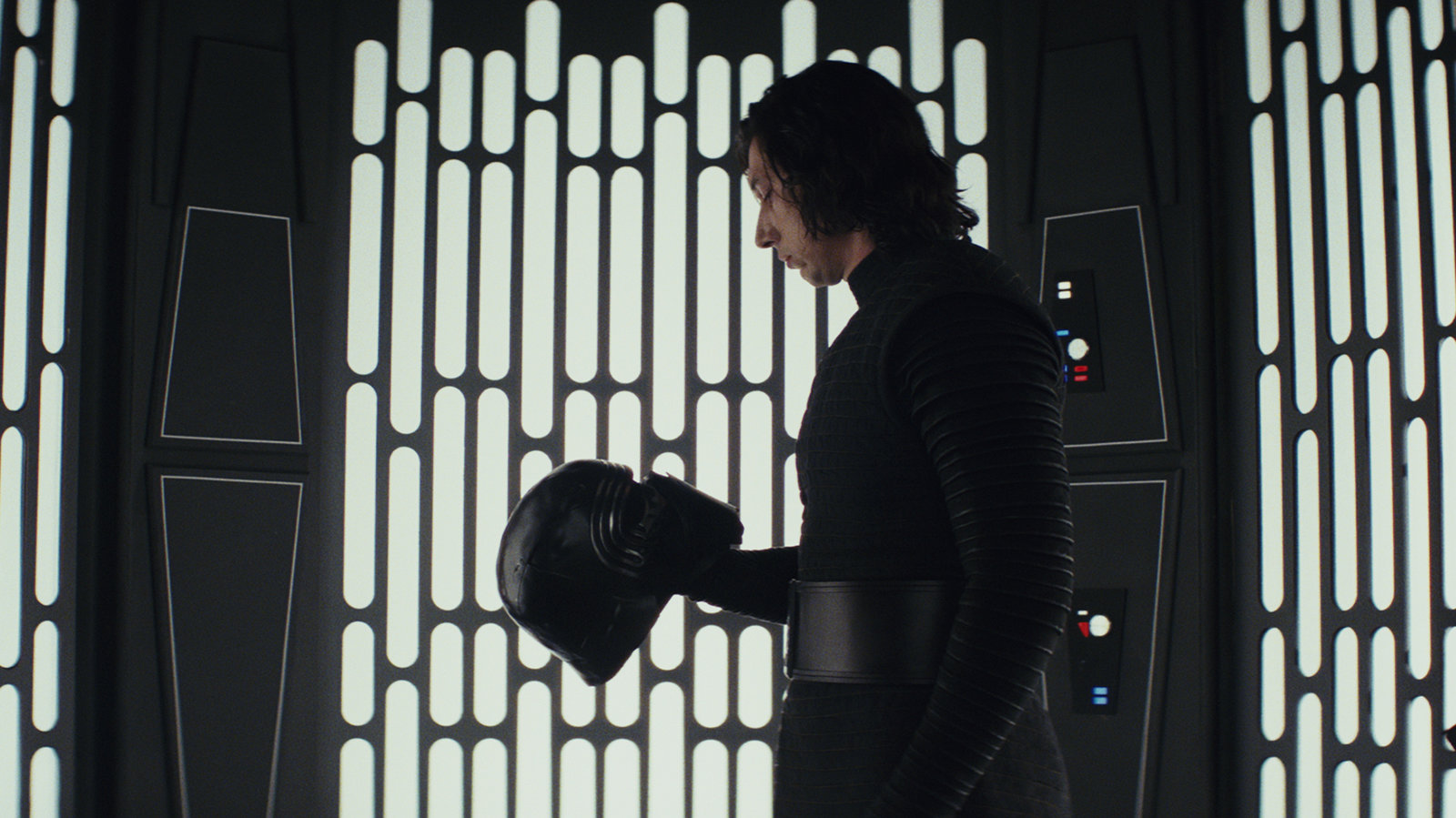 Ben questions his destiny as a dark side force user (an antagonist), as he stares at his Kylo Ren helmet. 