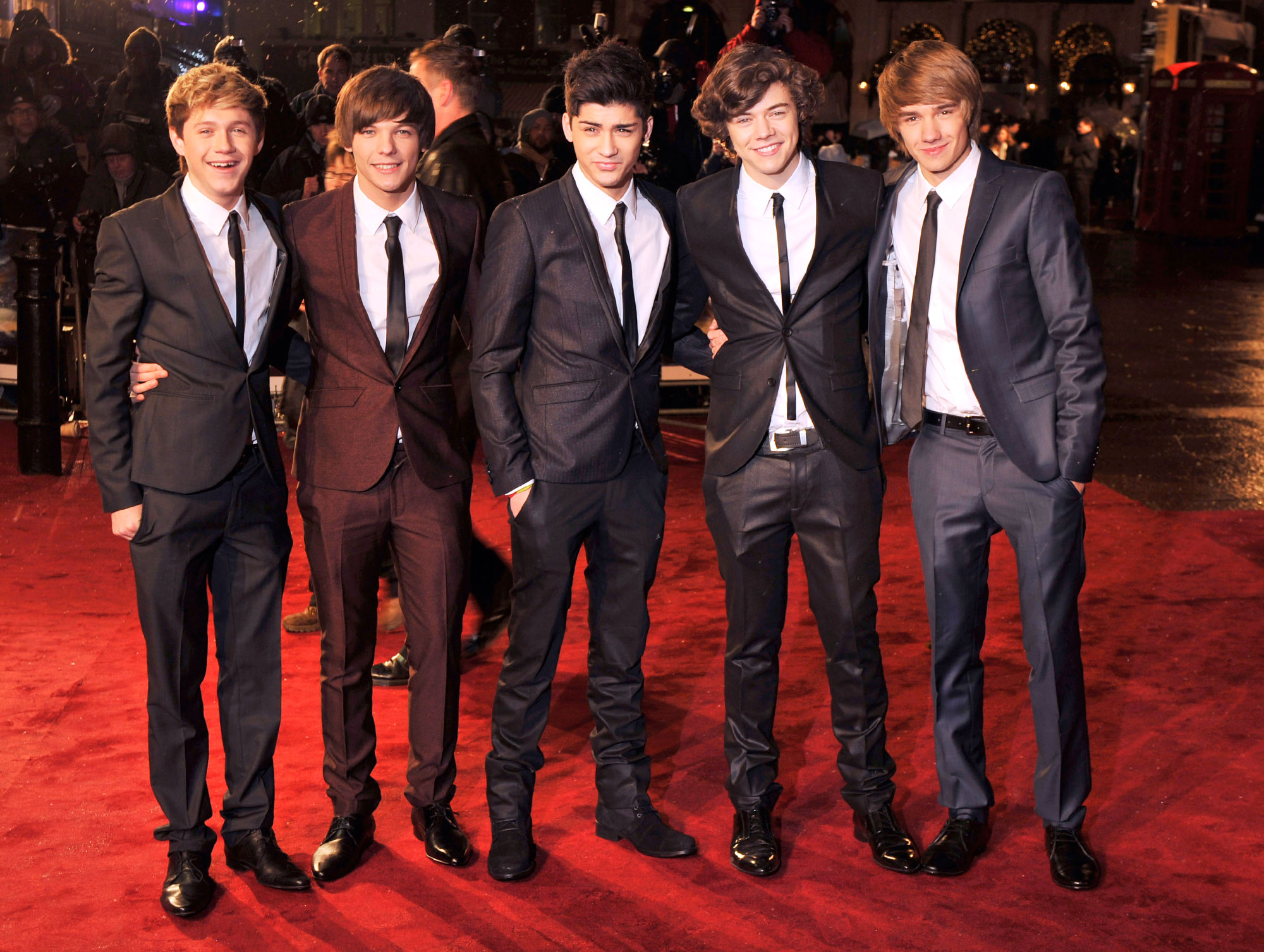 One Direction stands together on the red carpet in 2010.