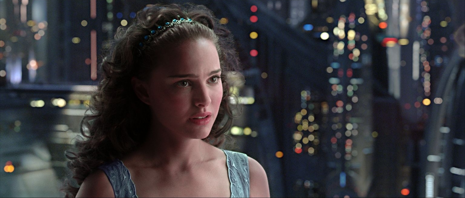 Padme from the Star Wars series, looking into the distant with worry in her eyes as the Clone Wars rage on and her husband falls to the dark side. 
George, Lucas, dir. Star Wars: Episode III- Revenge of the Sith. 2005.