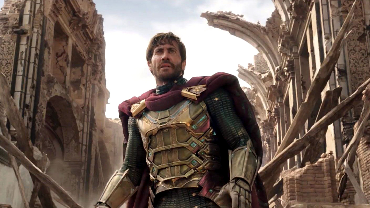 Watts, Jon, dir. Spider-Man: Far From Home. 2019. Mysterio stands in front of an old, destroyed house.