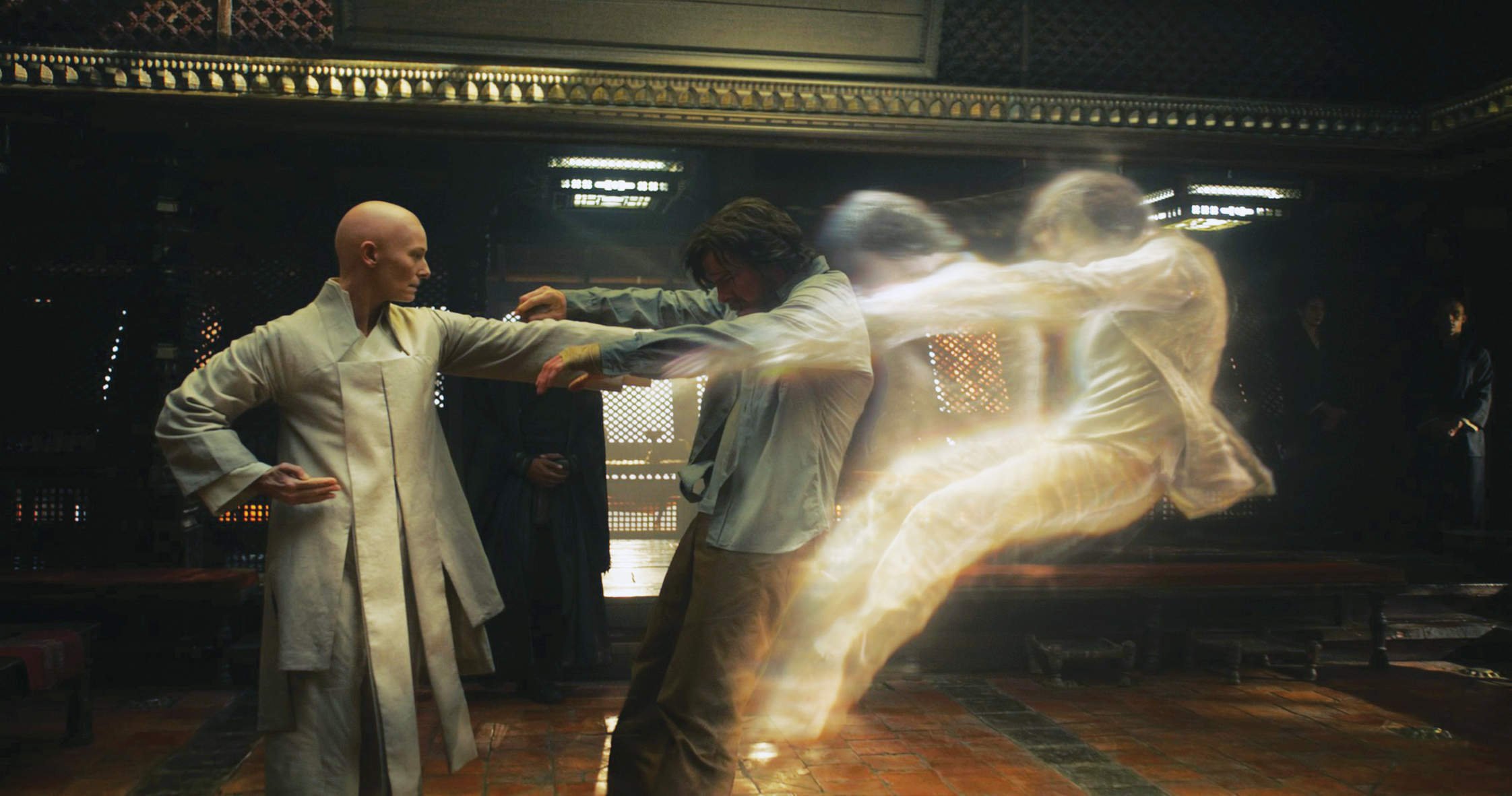 Tilda Swinton as the Ancient One pushing Benedict Cumberbatch as Stephen Strange into his astral form and through the different dimensions.