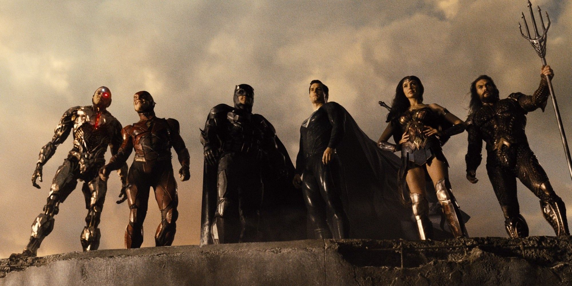 The Justice League stands atop the nuclear stack, victorious (Source: Warner Bros).