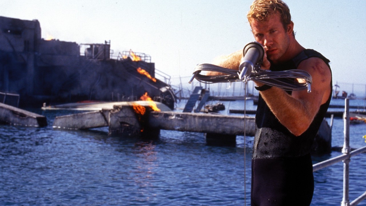 Harlin, Renny, dir. Deep Blue Sea. 1999
Carter Blake aims down a shark with a spear gun.