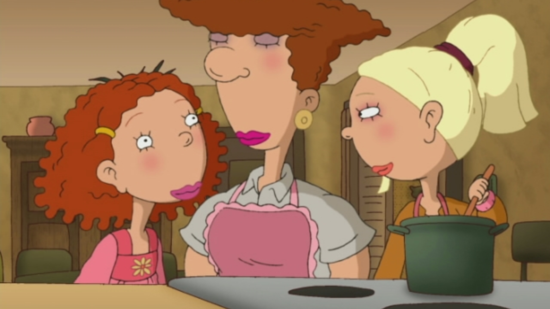 Ginger, her mom, and Courtney are cooking in the kitchen.