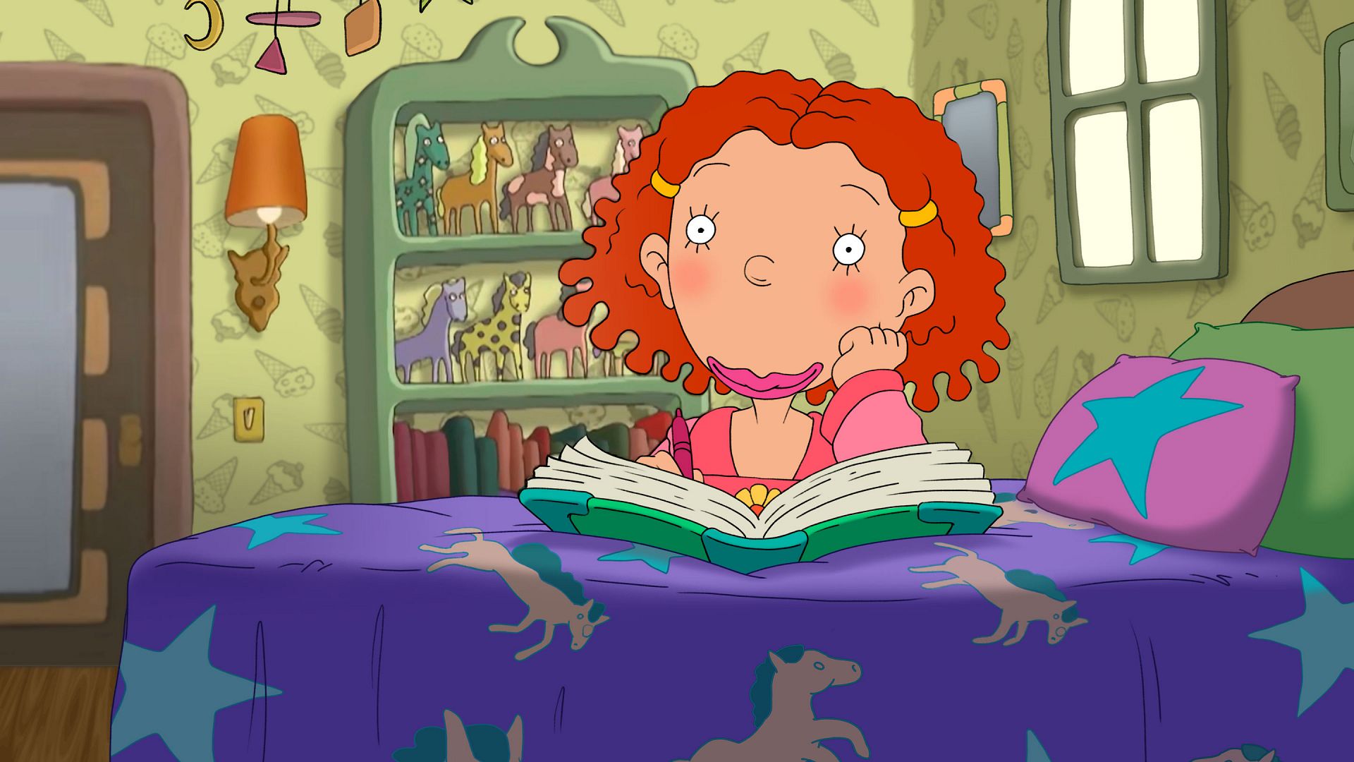 Ginger Foutley is smiling and writing in her journal.