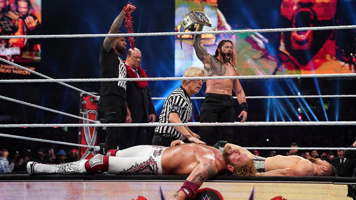 Roman Reigns celebrates his victory over Edge and Daniel Bryan at the main event of Night Two of WrestleMania 37 (WrestleMania 37. 1972-Present. World Wrestling Entertainment.).