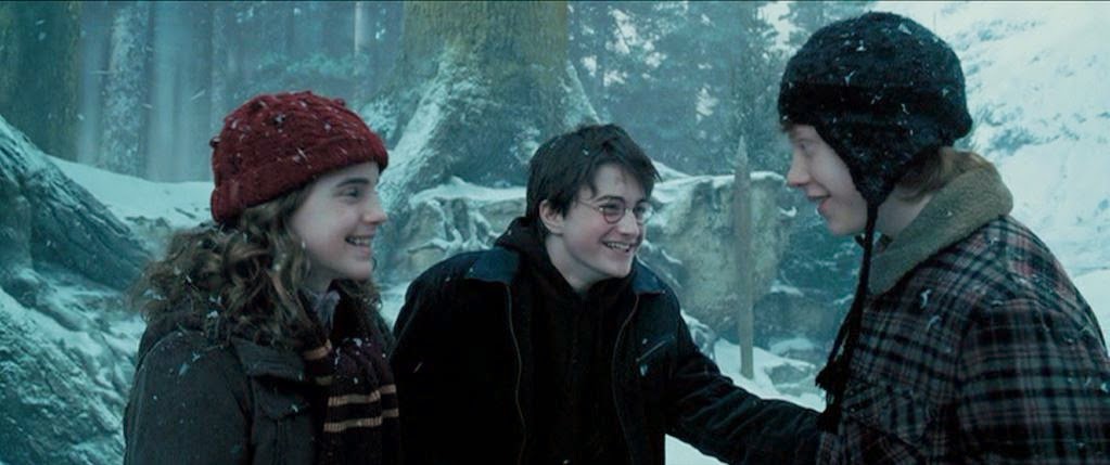 Harry, Ron, and Hermione enjoy a rare laugh. 