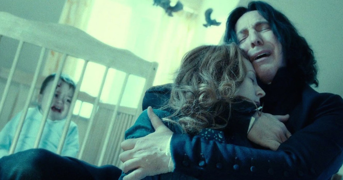 Scene from The Deathly Hallows Part 2, Snape holds Lilly's dead body and cries with Harry in the background. 