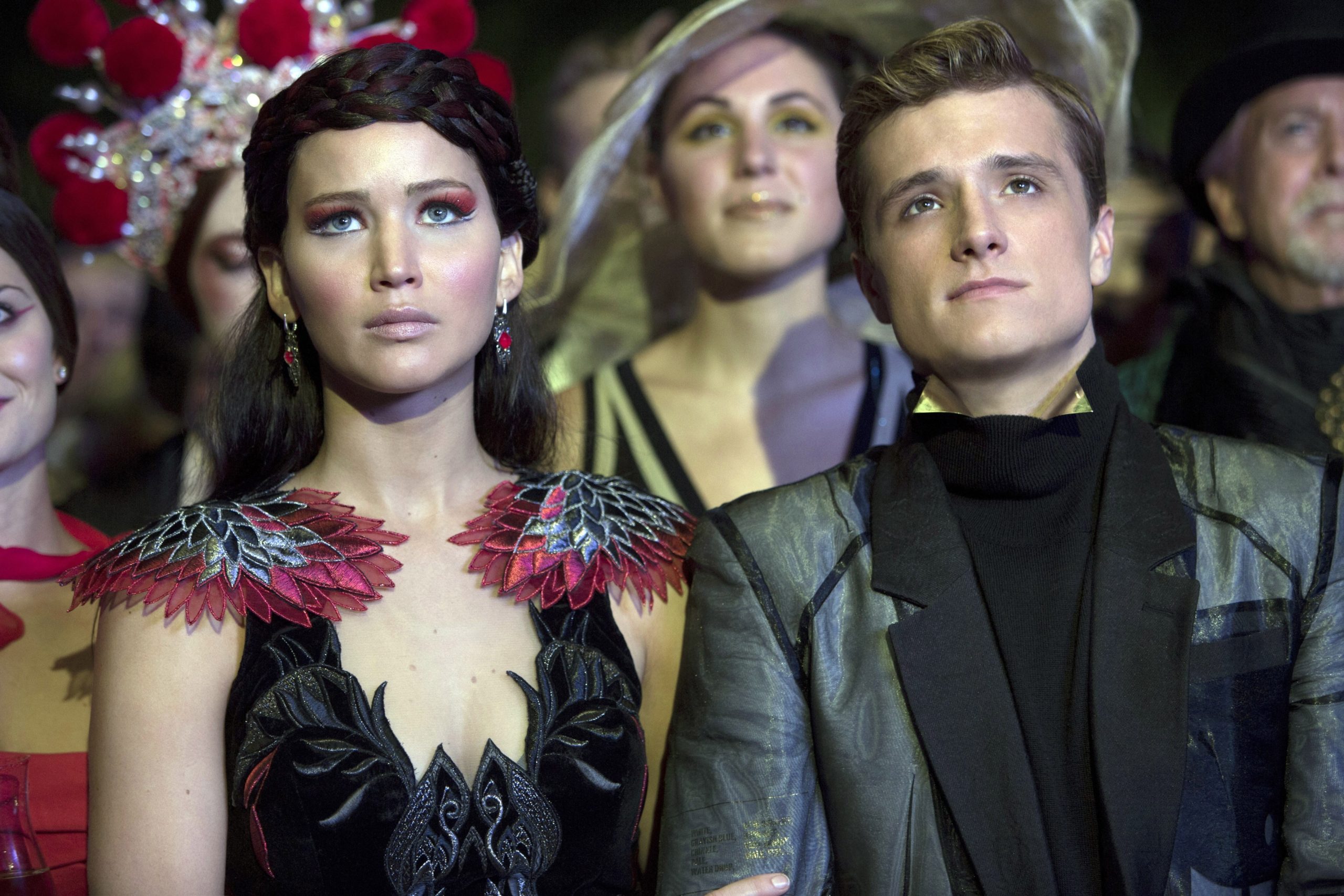 Katniss and Peeta at a party at President Snow's mansion in 'The Hunger Games: Catching Fire.'