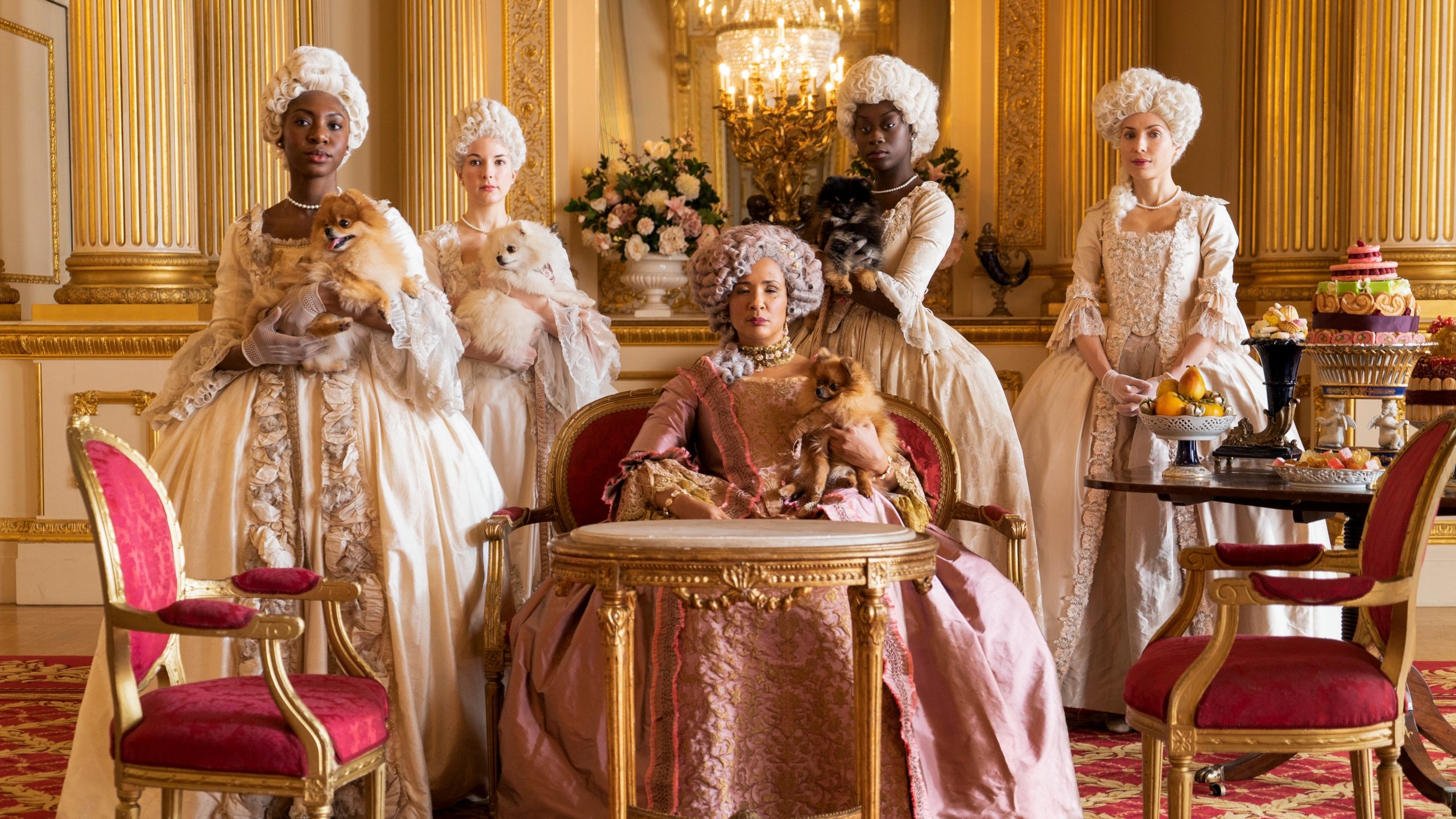 Bridgerton. 2020-present. Netflix Entertainment. The Queen seated with her handmaids circled around her. 