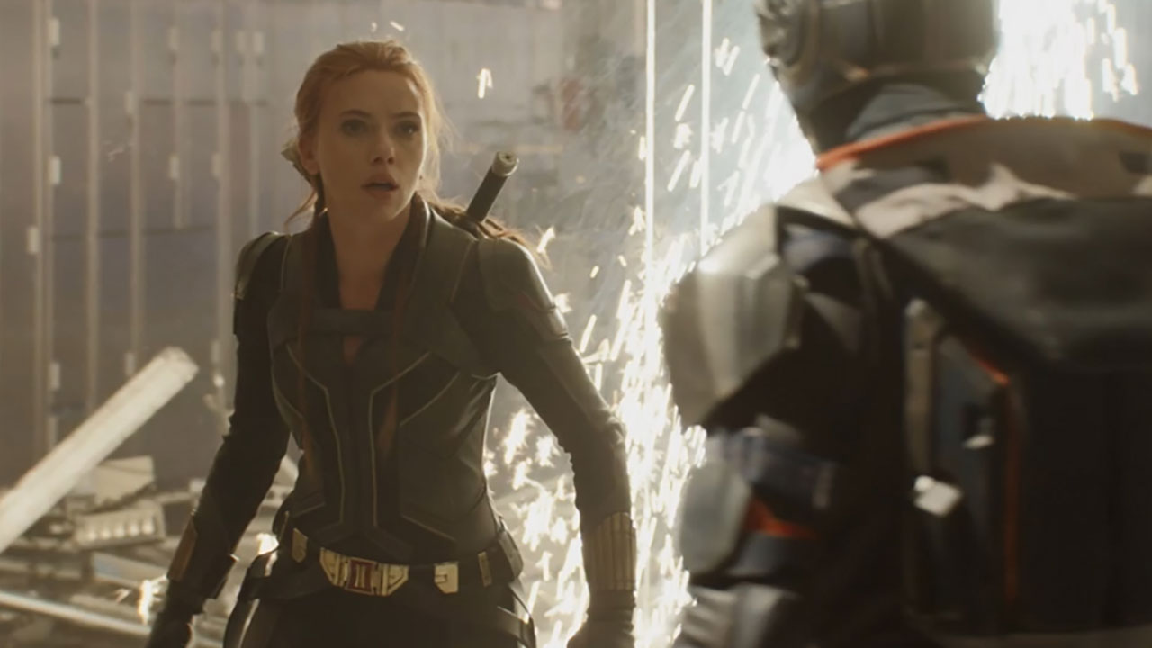 Scarlett Johansson as Natasha Romanoff facing off against the Taskmaster in Dreykov's office on the aerial Red Room base in Black Widow (2021).