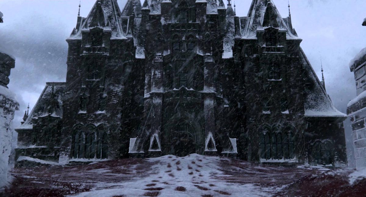 The exterior of Allerdale Hall, also known as Crimson Peak, in the middle of a snowstorm in Crimson Peak (2015). It looks like the typical home in a Gothic Romance. 