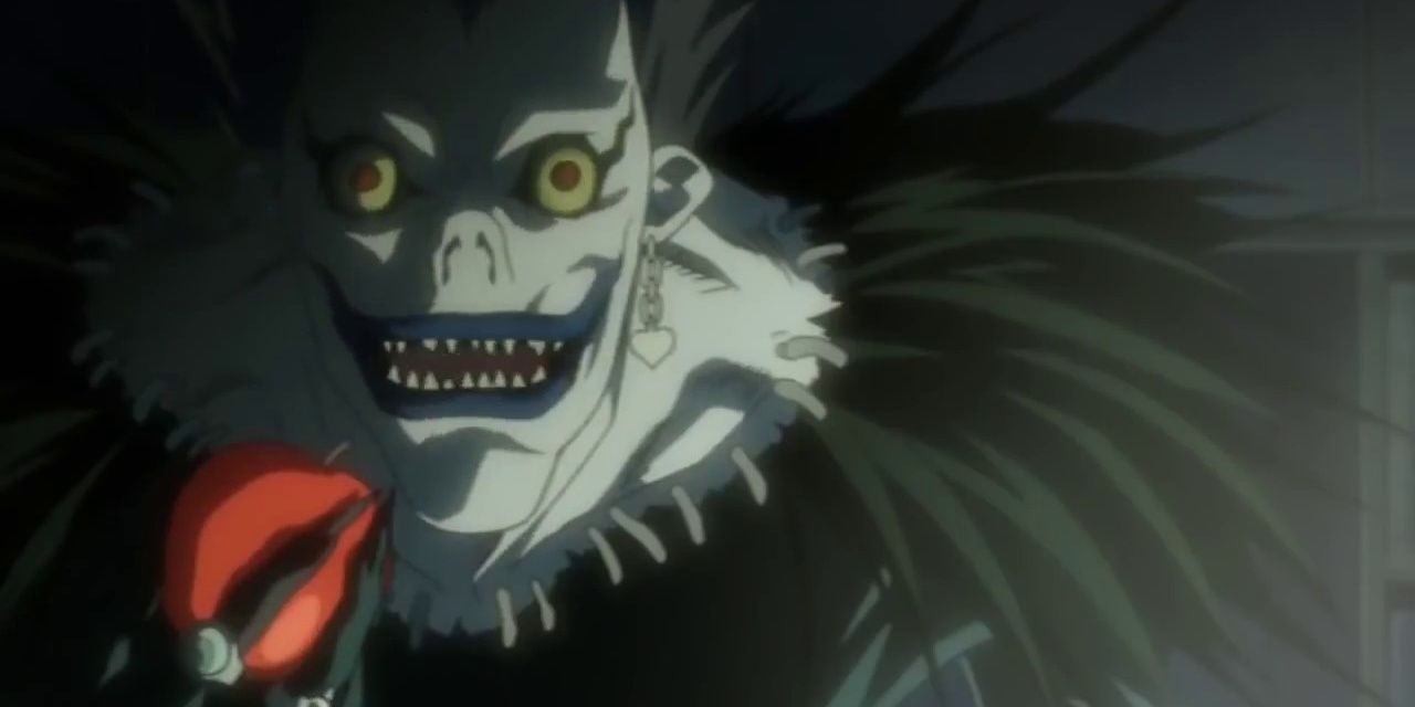 Ryuk grinning as he is about to consume his favorite food in Death Note (2006-2007).