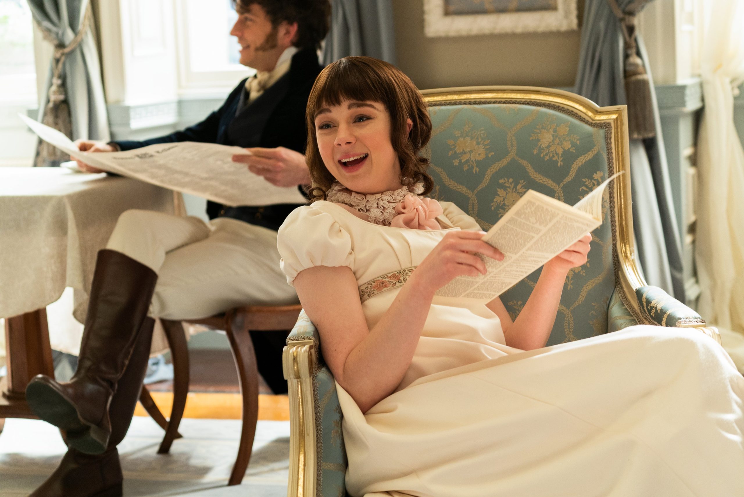 Eloise Bridgerton reads the latest installment of lady Whistledown in Netflix's Bridgerton (2020-Present).