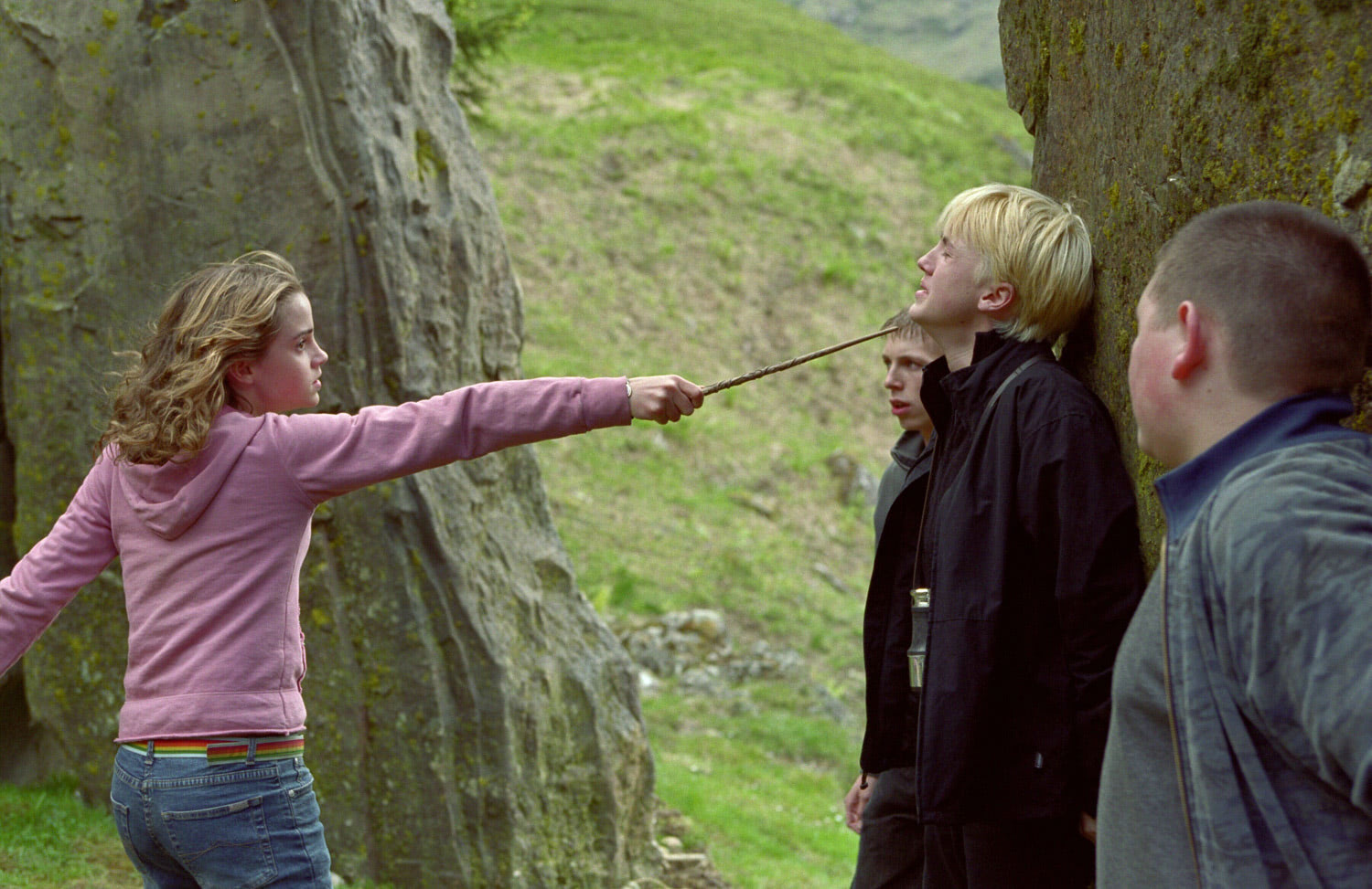 Hermione Granger pointing her wand towards Draco Malfoy in Harry Potter and the Prisoner of Azkaban (2004). 