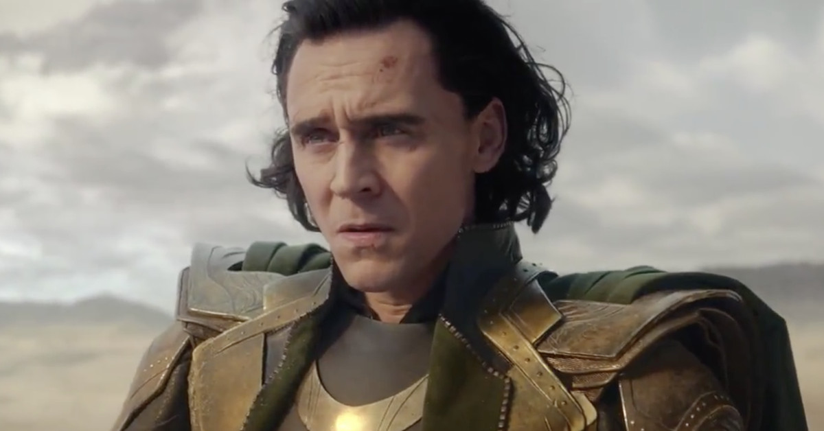 Loki from the show "Loki," looking confused and lost in a desert.