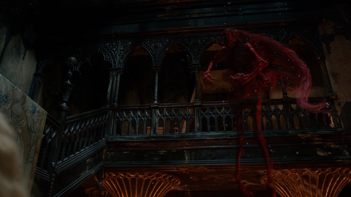 One of the red ghosts of Crimson Peak (2015) haunting the foyer of Allerdale Hall, also known as Crimson Peak.
