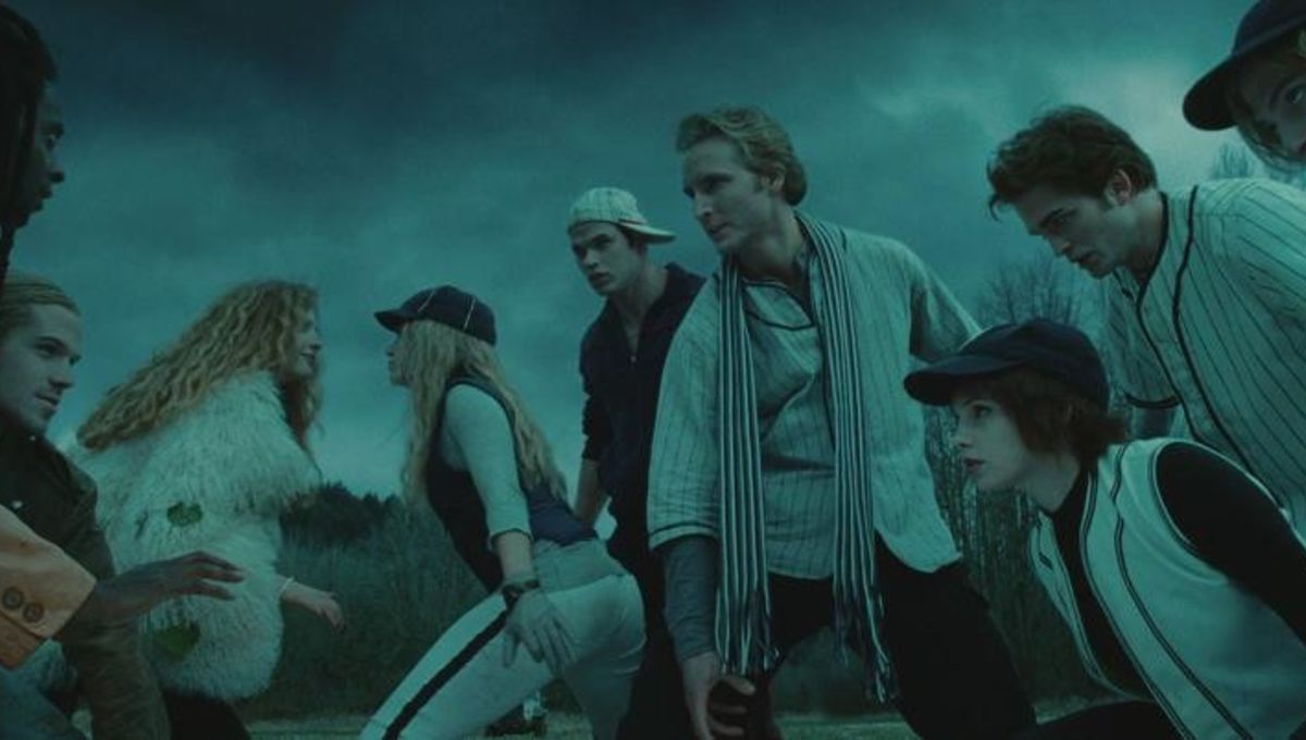 Laurent, James, and Victoria face off against Rosalie, Emmett, Carlisle, Alice, and Edward Cullen on the baseball field in 'Twilight' (2008).