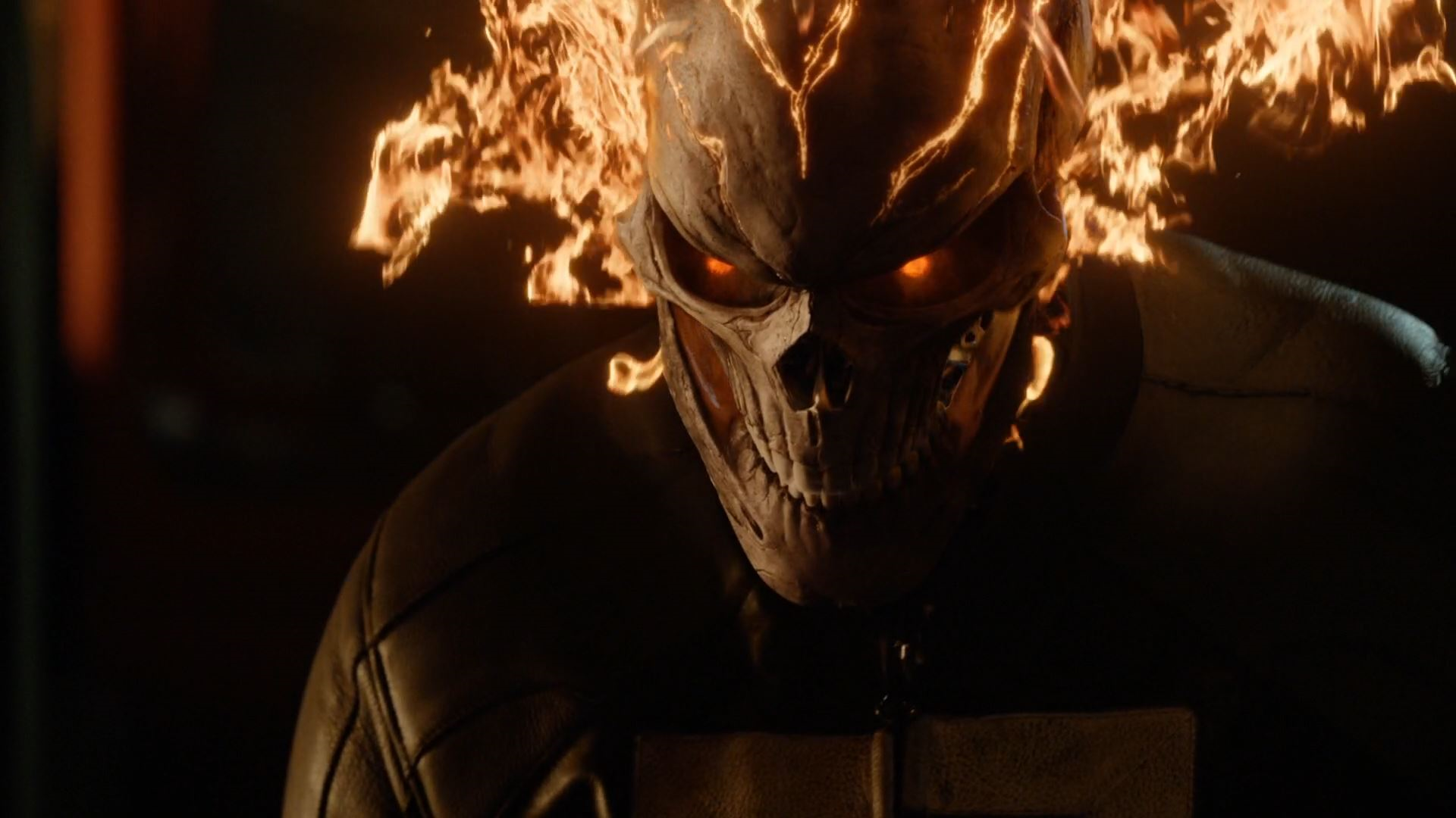 Robbie Reyes' incarnation of the Ghost Rider from Agents of Shield. His skull is flaming and his eyes glow red.