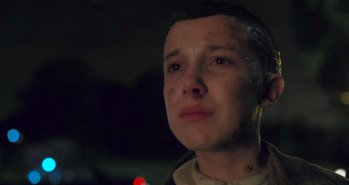 Eleven sees Mike through the window after escaping the Upside Down.