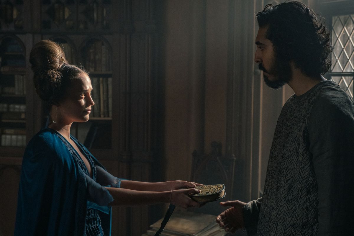 Alicia Vikander as the Lady and Dev Patel as Sir Gawain in The Green Knight (2021).