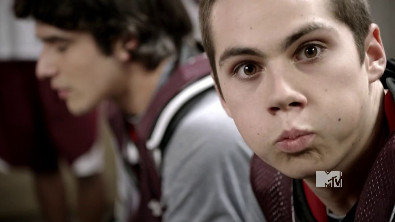 Stiles making a funny face, looking straight into the camera in Teen Wolf (2011-2017).