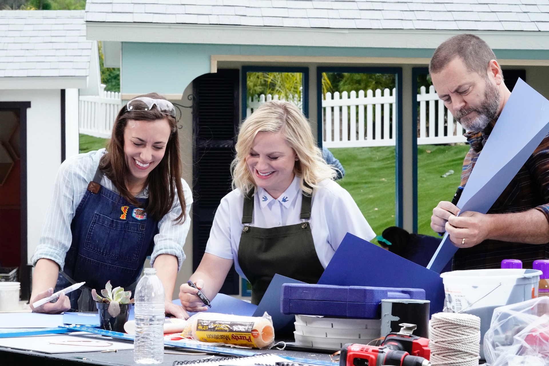 Poehler and Offerman helping out Justine, one of the makers, in the show's second season.