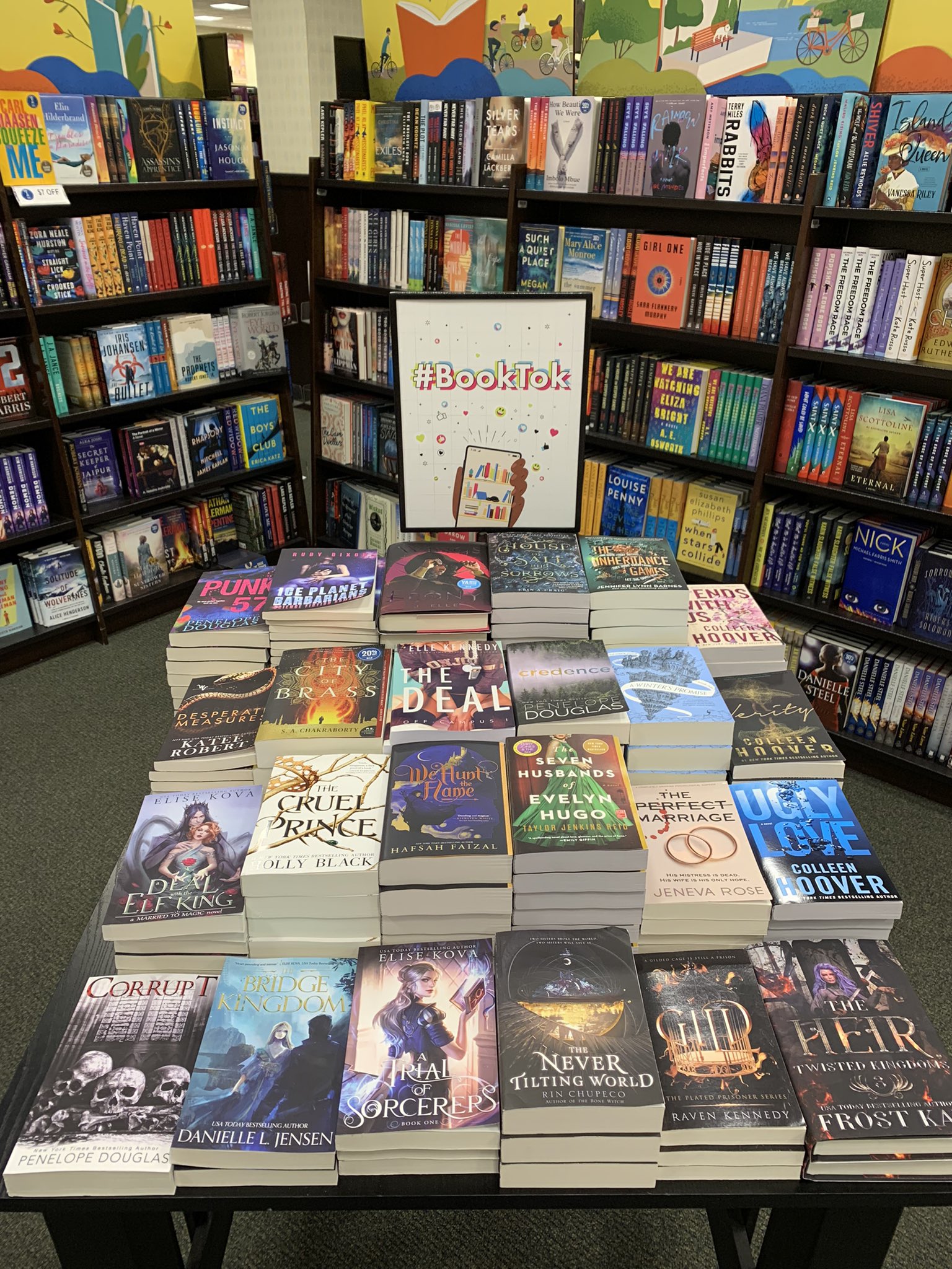 Photo of a display table in a Barnes & Nobles store containing many of the most-talked about books on TikTok.