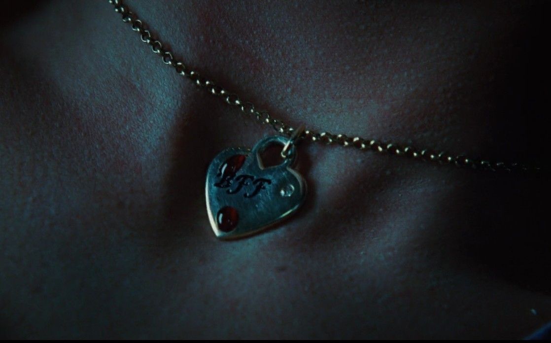 Jennifer's 'BFF' necklace has blood on it after fighting her best friend in 'Jennifer's Body' (2009).