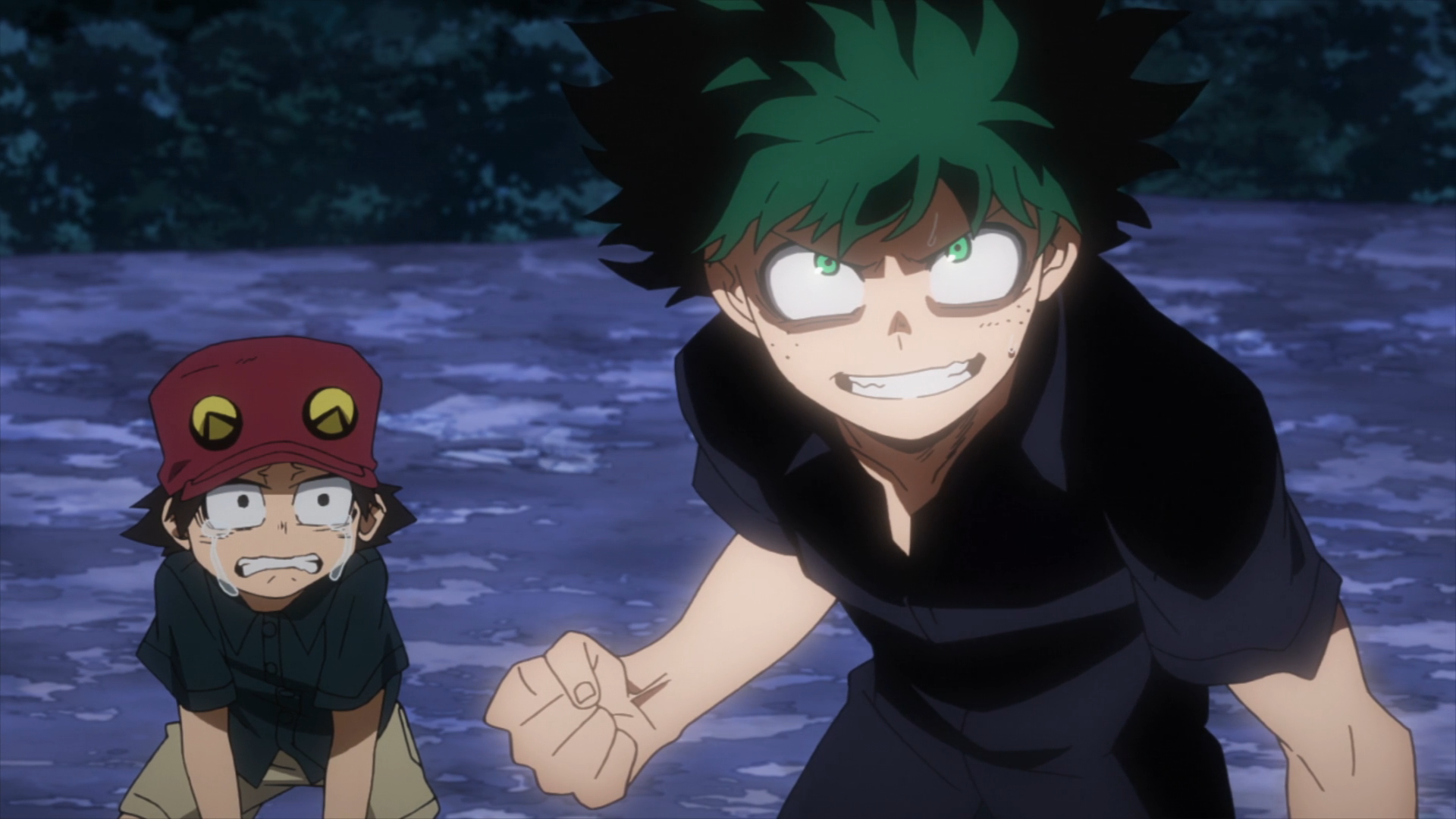 Deku stands in front of Kota as he promises to protect him. 