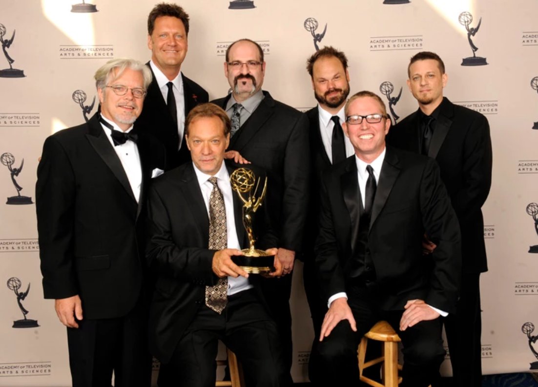 KNB Effects posing on the carpet after winning an award for their work on AMC's 'The Walking Dead' (2010-current).