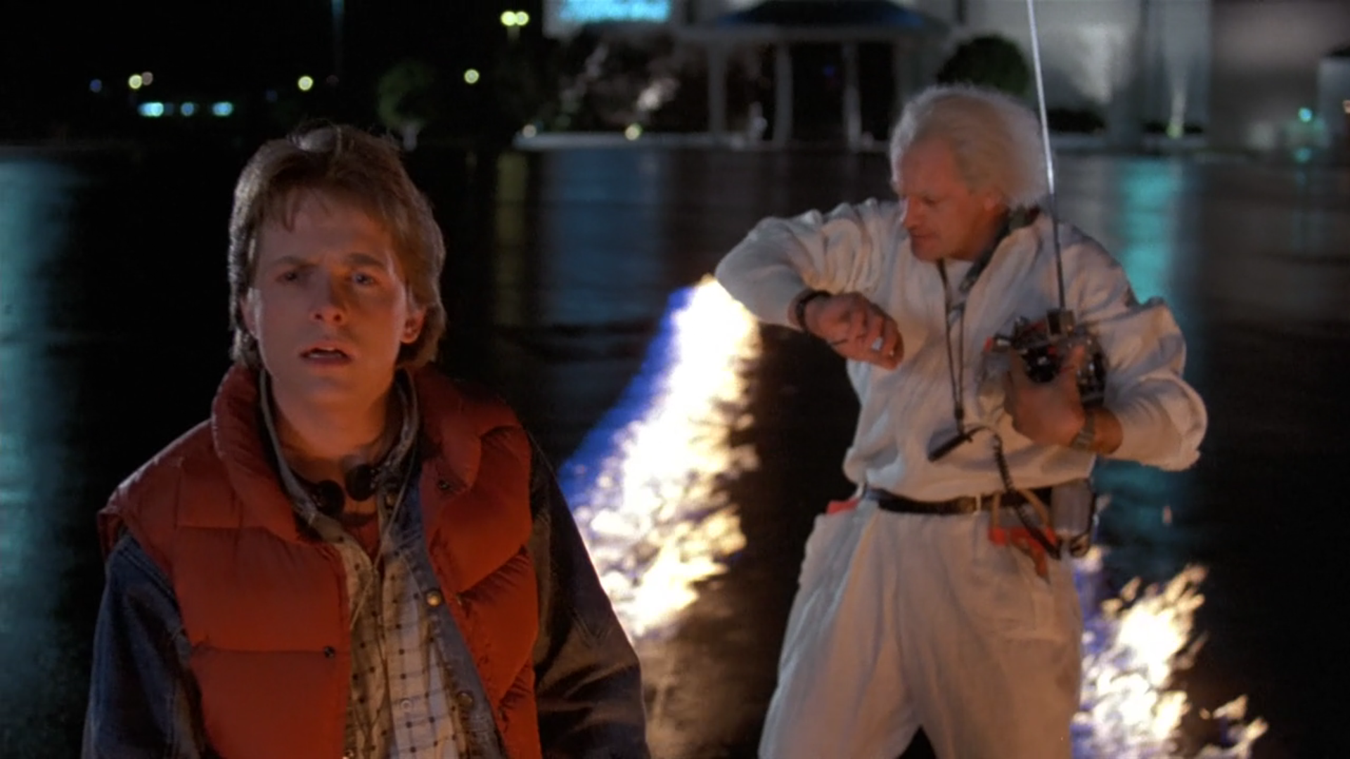 Doc and Marty watching the DeLorean test run.