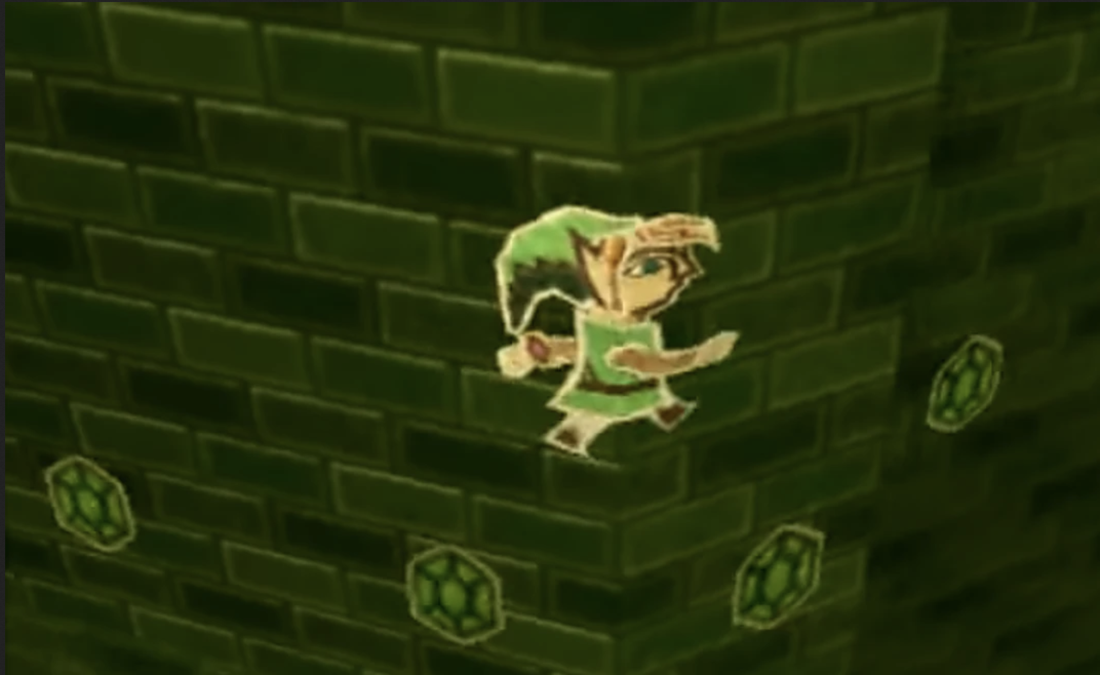 An image of Link from "A Link Between Worlds" (2013). He is a stylized figure in green against a darker green, brick-patterned background.