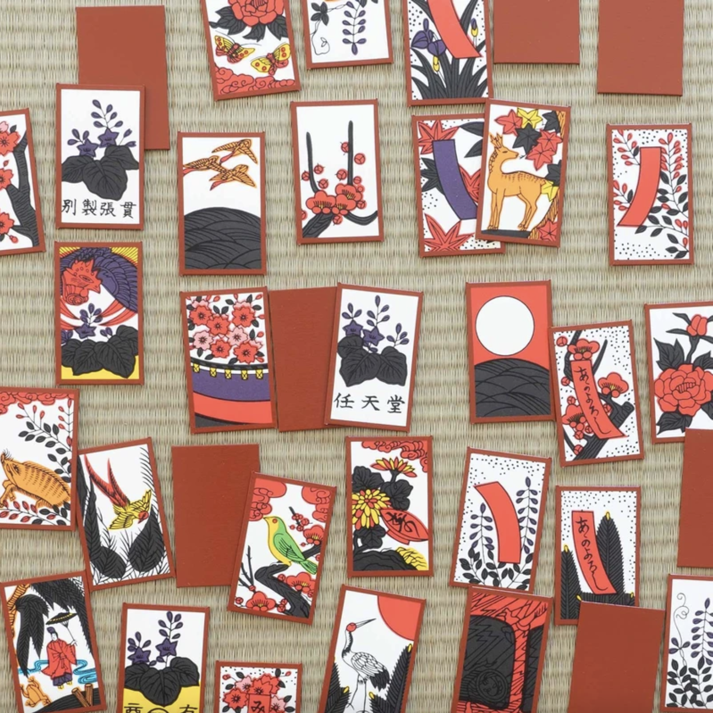 An image of some of Nintendo's hanafuda cards, stylized Japanese playing cards with traditional Japanese artwork.