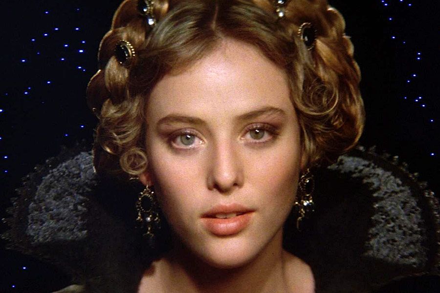 An image of Princess Irulan from the 1984 'Dune' against a starry background.