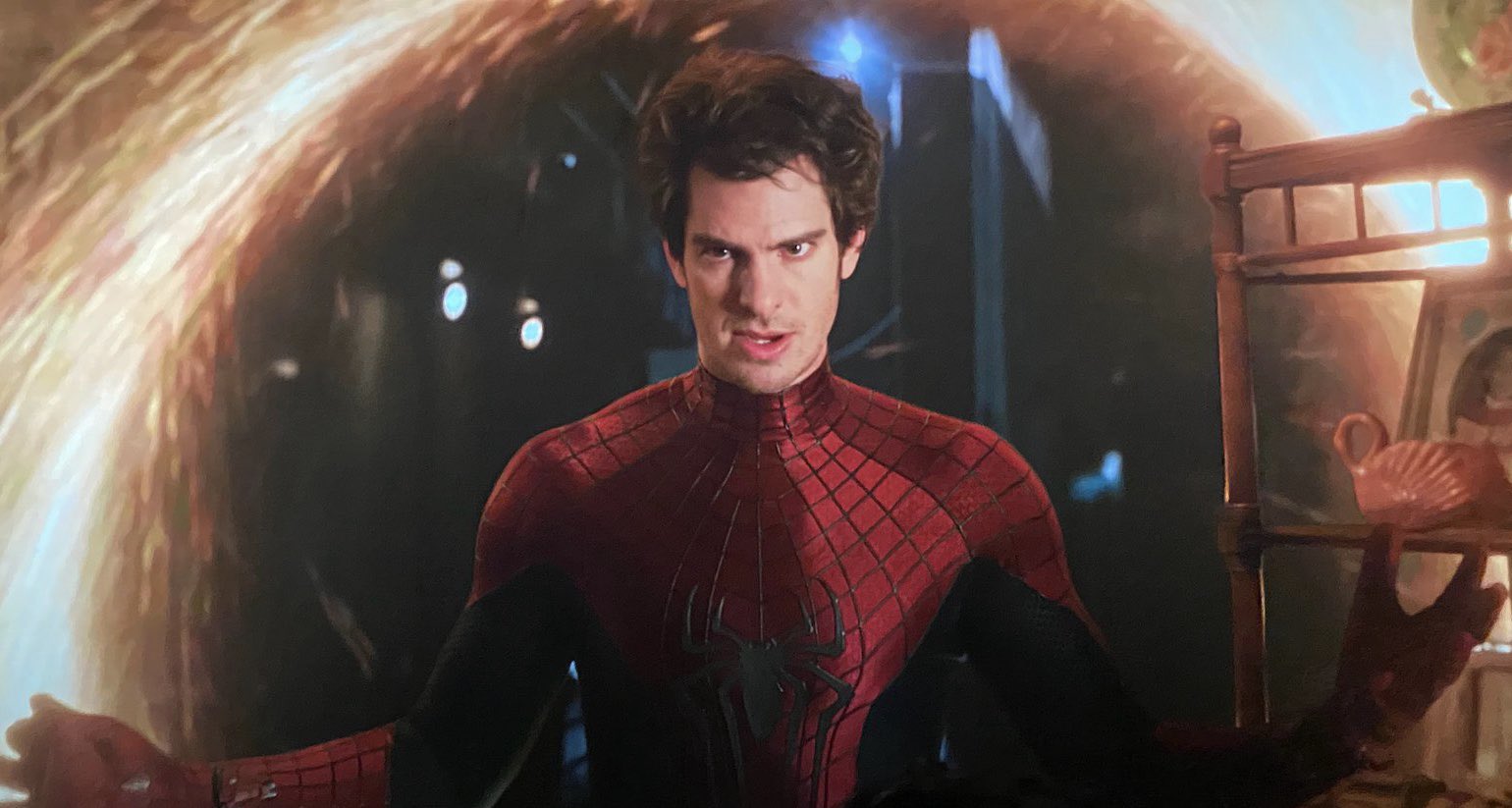 Andrew Garfield's Spider-Man steps out of a portal.