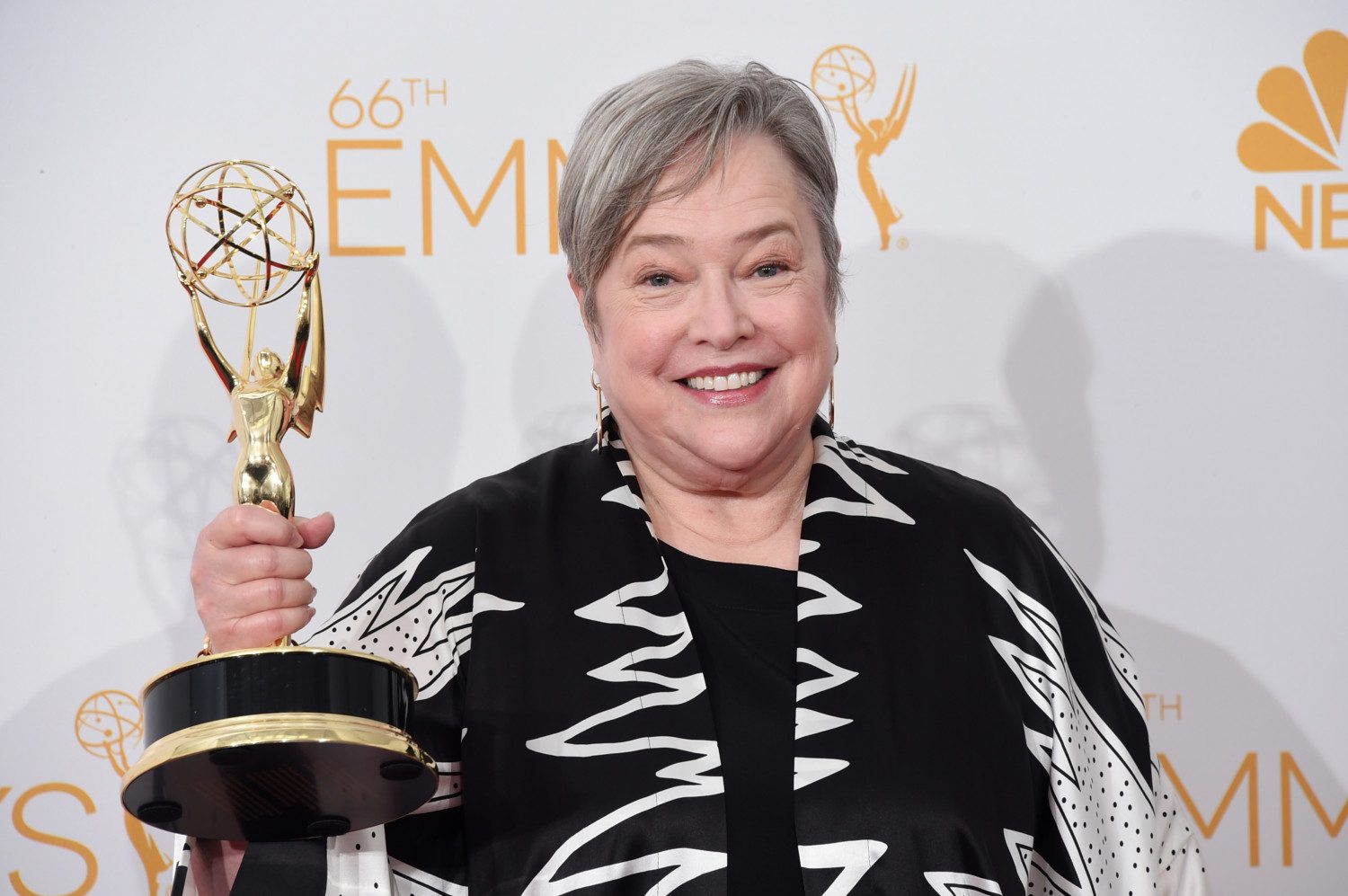 Kathy Bates flaunting her award after winning an Emmy, 2014. (Photo by Television Academy).